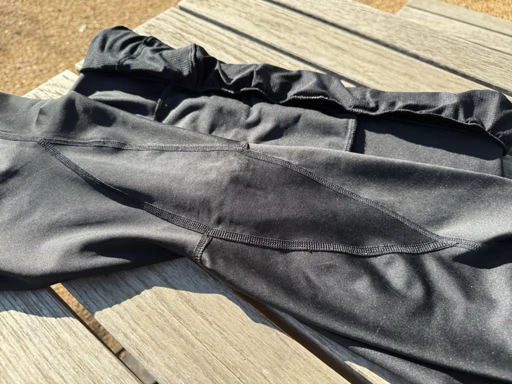 A shot of the entire rounded-diamond-shaped crotch gusset, stretching from halfway down one leg to halfway down the other A shot of the entire rounded-diamond-shaped crotch gusset, stretching from halfway down one leg to halfway down the other