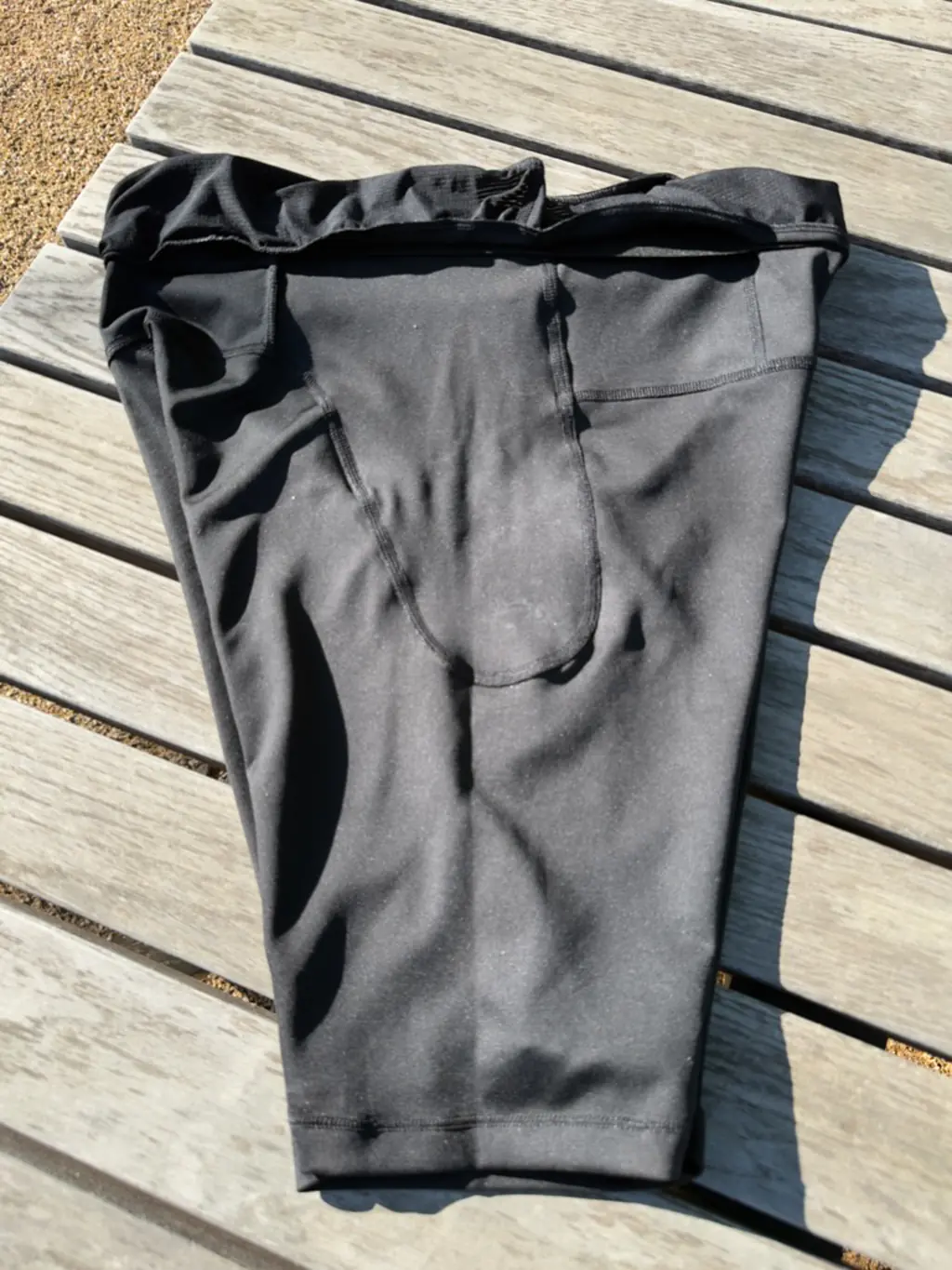 A top down view of the inside of the side of the half tights, showing the seam construction of the side pockets A top down view of the inside of the side of the half tights, showing the seam construction of the side pockets