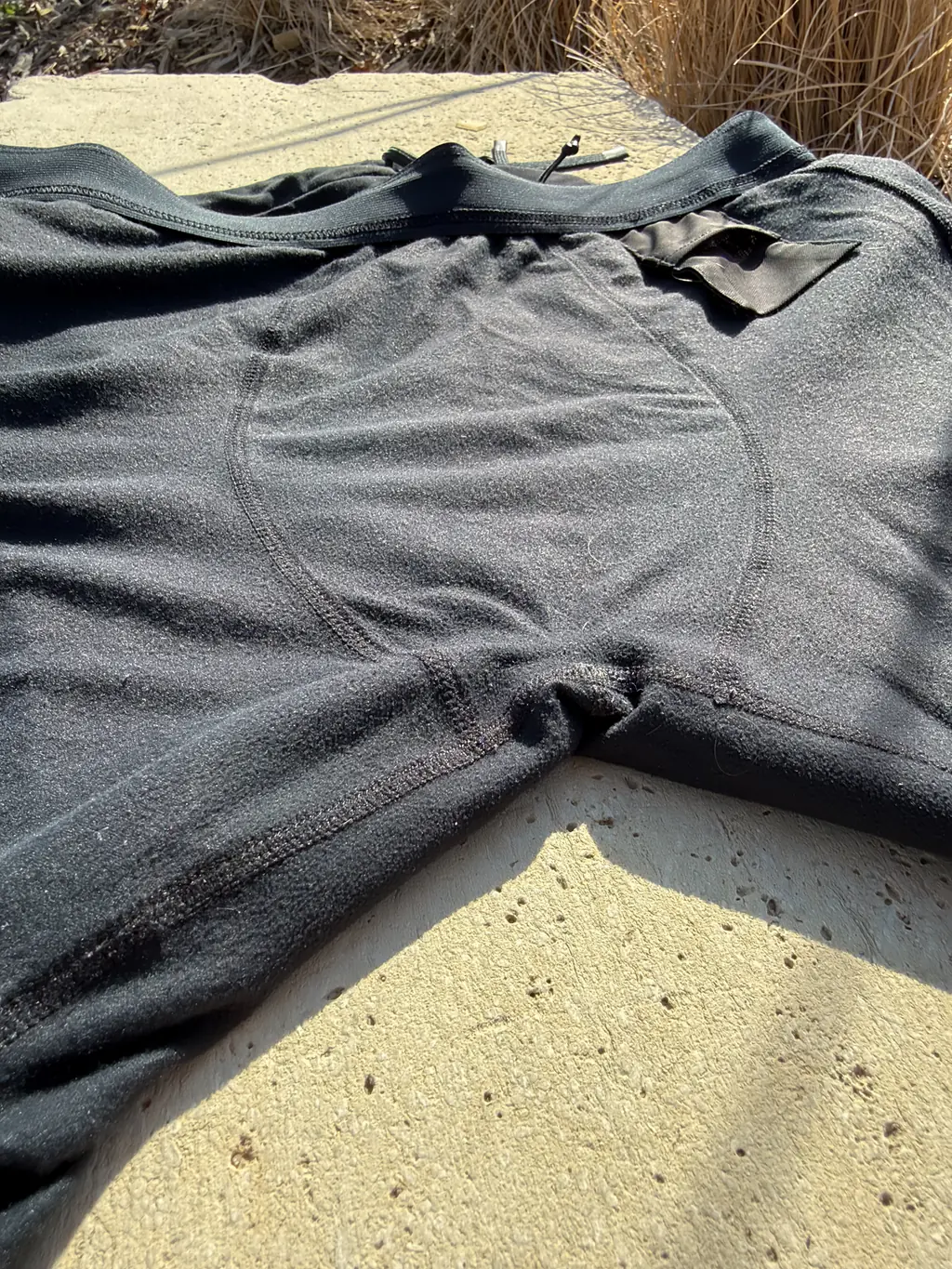 A view of the interior crotch construction, showing no gusset and many seams coming together A view of the interior crotch construction, showing no gusset and many seams coming together
