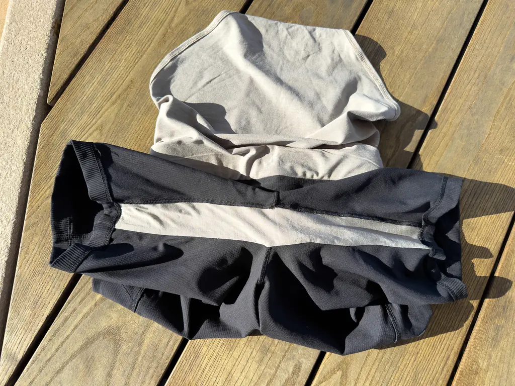 A view of the interior double layer fabric gusset or inseam running from the opening of one leg to the other, using the same fabric inside as the brief liner. A view of the interior double layer fabric gusset or inseam running from the opening of one leg to the other, using the same fabric inside as the brief liner.