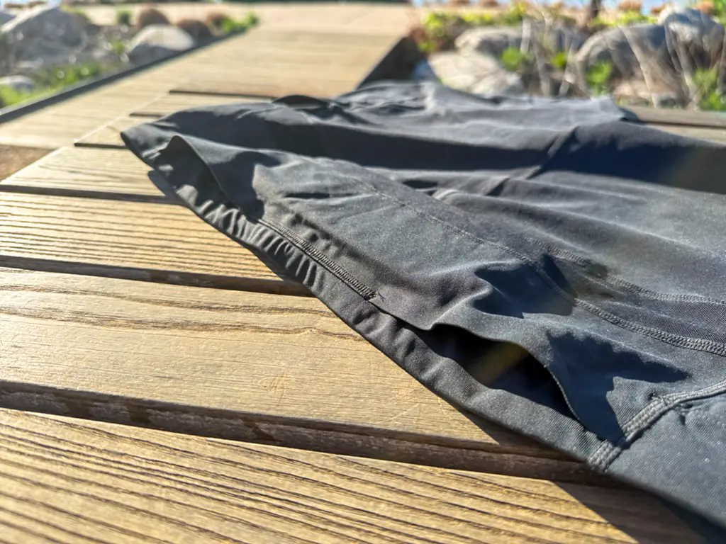 A view of the rear pocket openings, showing the large, deep pass through pocket. A view of the rear pocket openings, showing the large, deep pass through pocket.