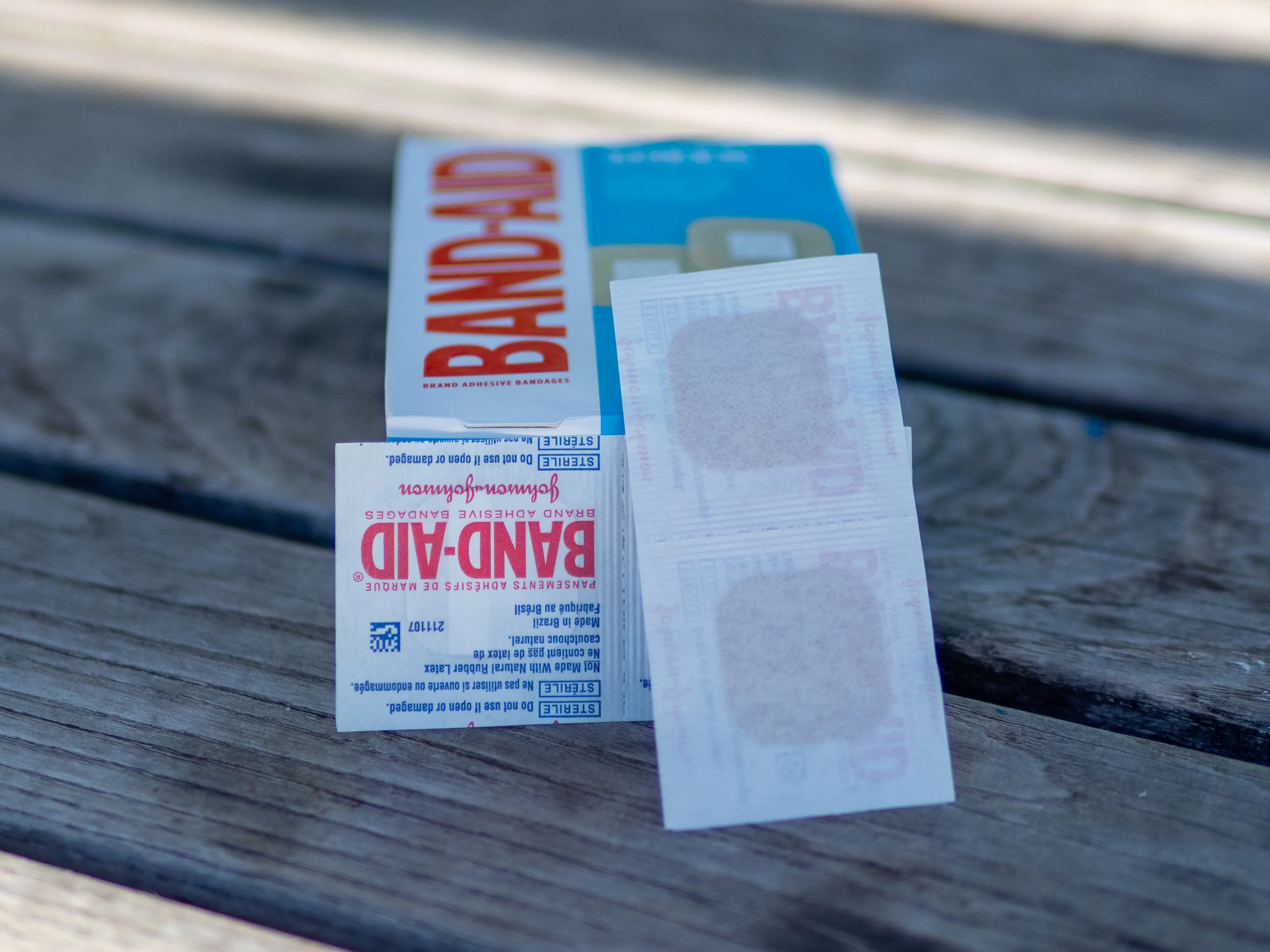 A closeup of the BAND-AID Sheer Spots in their wrappers. A closeup of the BAND-AID Sheer Spots in their wrappers.