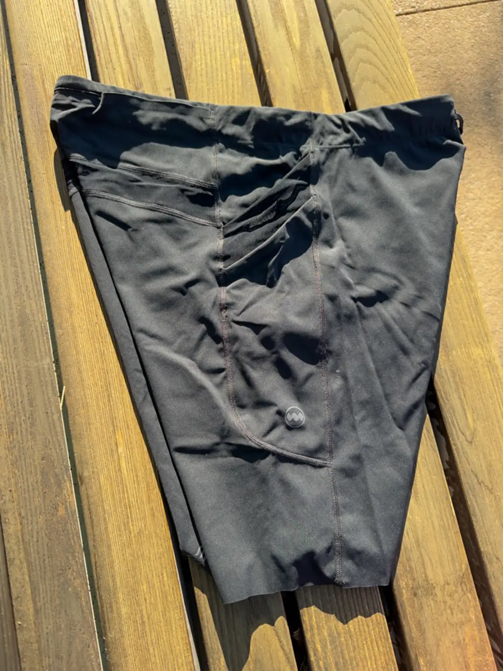 A view of the side of the half tights, showing the two stacked pockets (empty) A view of the side of the half tights, showing the two stacked pockets (empty)