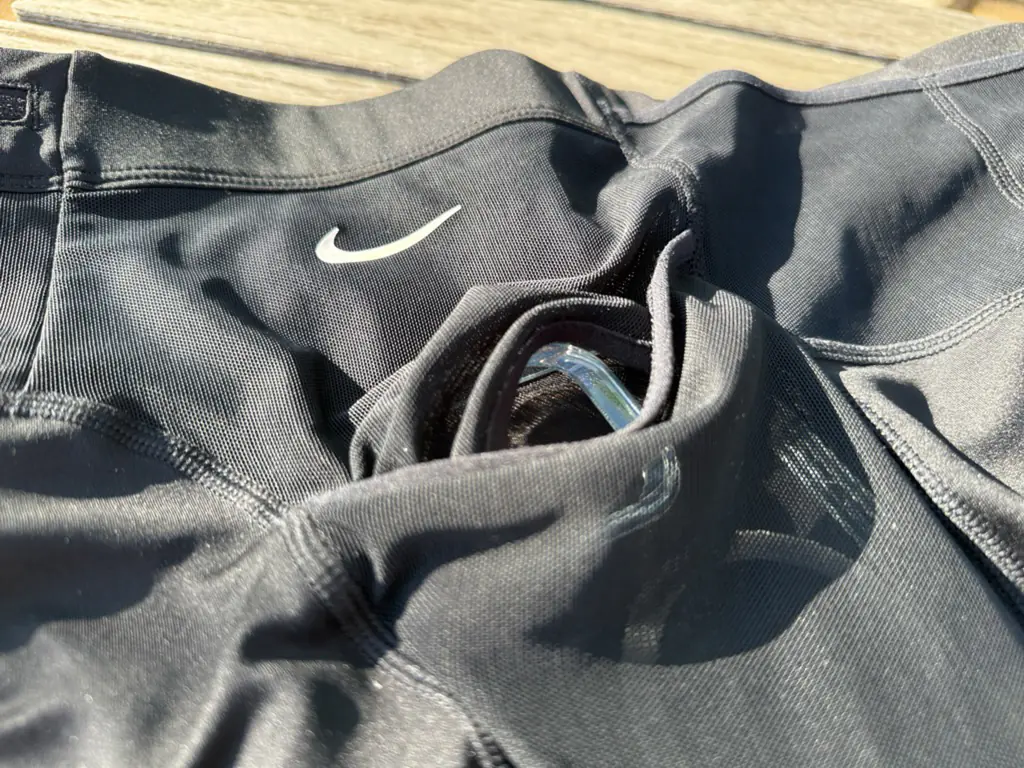 A close up view of the side pocket showing the unique top/bottom split opening, with the top mesh extending to the waistband A close up view of the side pocket showing the unique top/bottom split opening, with the top mesh extending to the waistband
